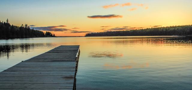 lake with dock at sunset, MB